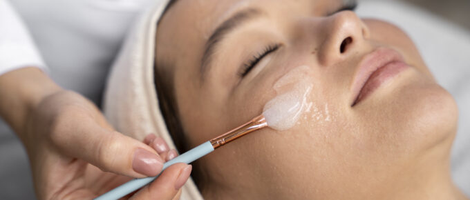 woman receiving a VI Peel from APDKC dermatologist